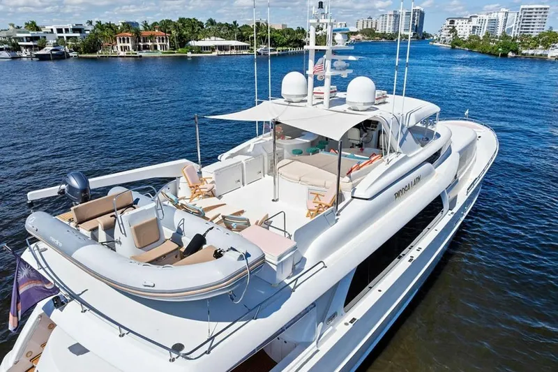 Slide: The Image of Luxurious 2001 West Bay Sonship yacht cruising on a scenic waterway. - 28