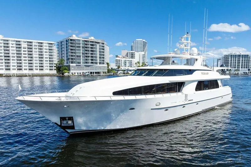 Slide: The Image of Luxury 2001 West Bay Sonship yacht cruising near urban waterfront buildings. - 29