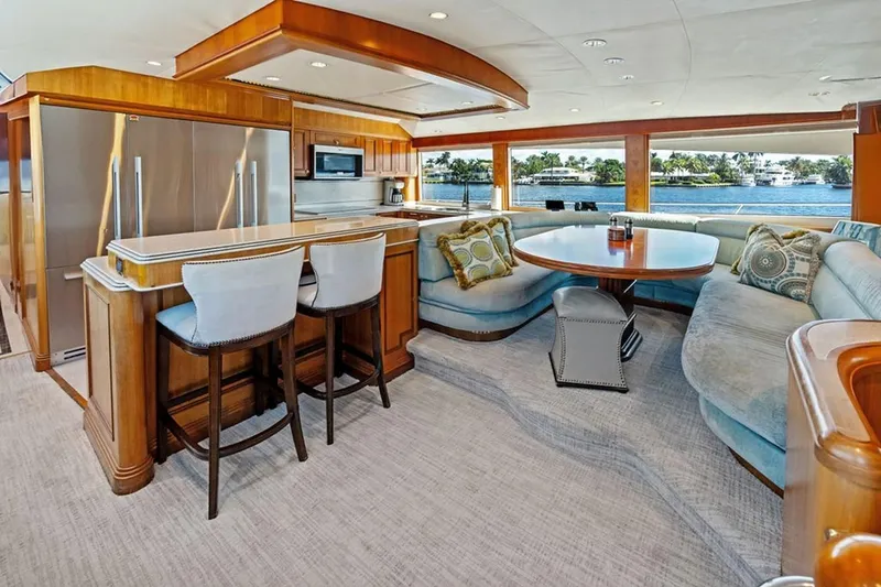 Slide: The Image of Luxurious 2001 West Bay Sonship yacht interior with modern kitchen and elegant dining area. - 6