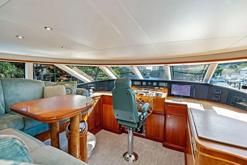 Slide: The Image of Luxurious 2001 West Bay Sonship yacht interior with helm, seating, and navigation equipment. - 7