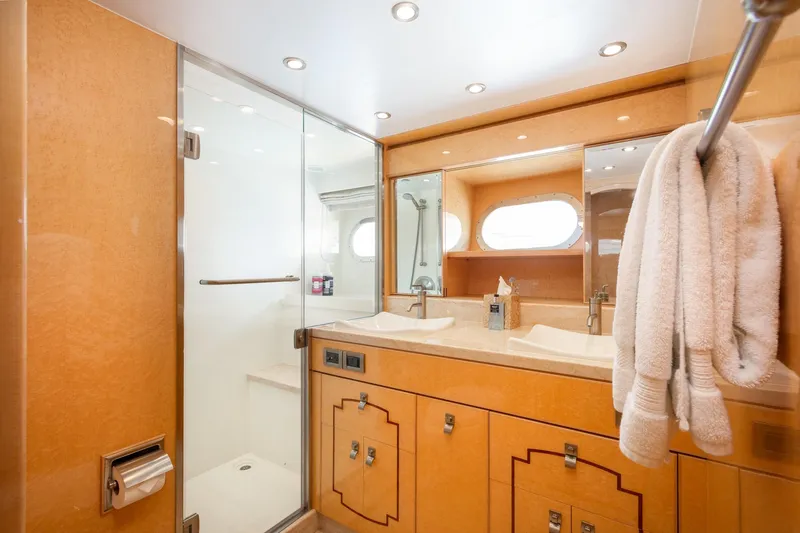 Slide: The Image of Luxurious bathroom in 2014 Hargrave Sky Lounge yacht with dual sinks and glass shower. - 28