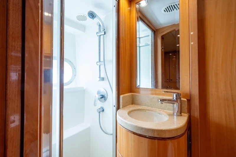 Slide: The Image of Luxurious bathroom in 2014 Hargrave Sky Lounge yacht with modern fixtures and wooden accents. - 39