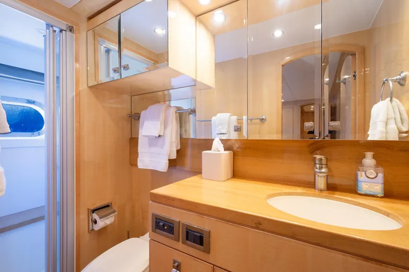 Slide: The Image of Luxurious bathroom in 2014 Hargrave Sky Lounge yacht with modern fixtures and wooden cabinetry. - 40