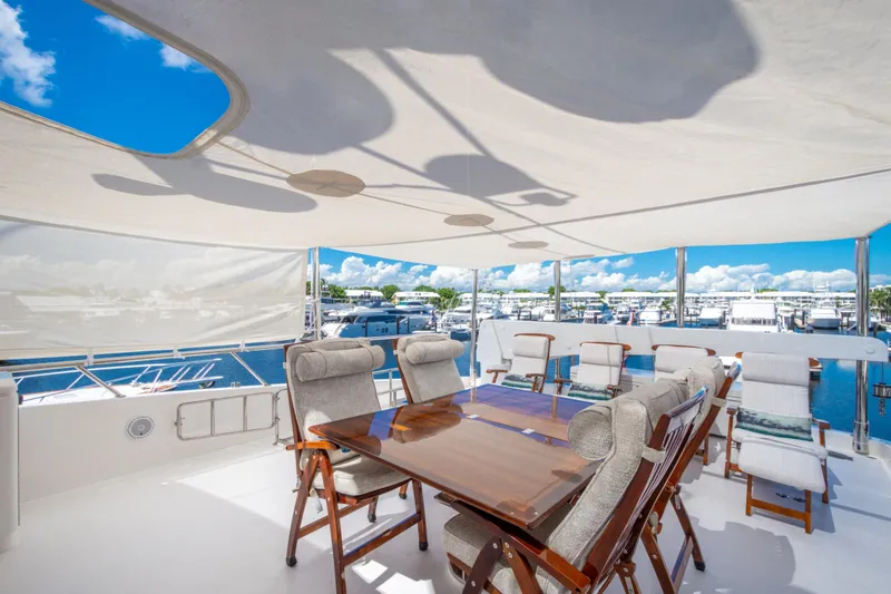 Slide: The Image of Luxurious 2014 Hargrave Sky Lounge yacht deck with elegant seating and marina view. - 6
