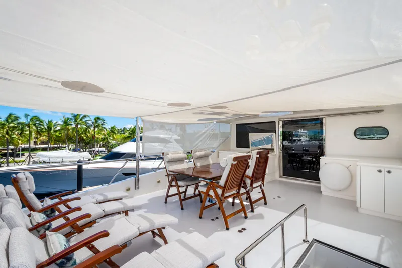 Slide: The Image of Luxurious 2014 Hargrave Sky Lounge yacht deck with seating, dining area, and canopy. - 7