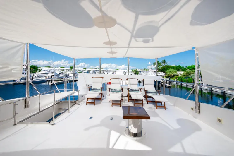 Slide: The Image of Luxurious 2014 Hargrave Sky Lounge yacht deck with sun loungers and marina view. - 8