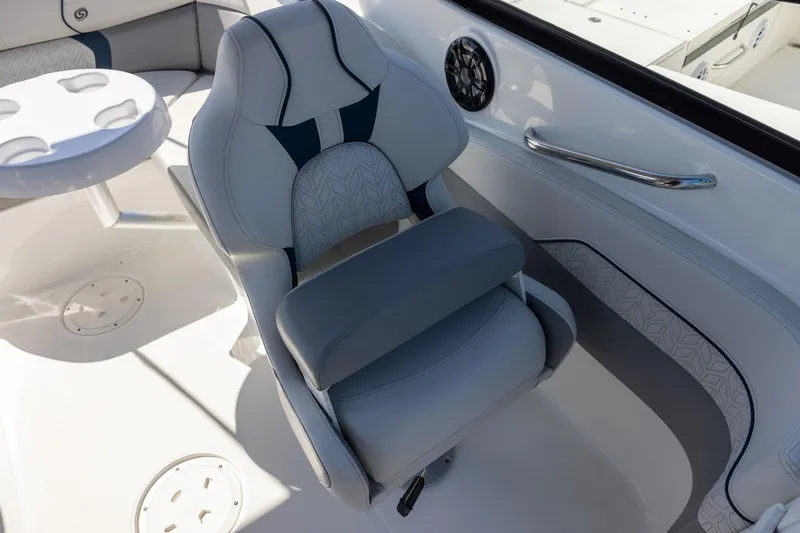 Slide: The Image of 2023 Hurricane SunDeck 2400 OB boat interior with luxurious seating and modern design. - 11
