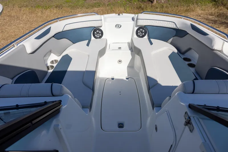 Slide: The Image of 2023 Hurricane SunDeck 2400 OB boat interior with spacious seating and modern design. - 13