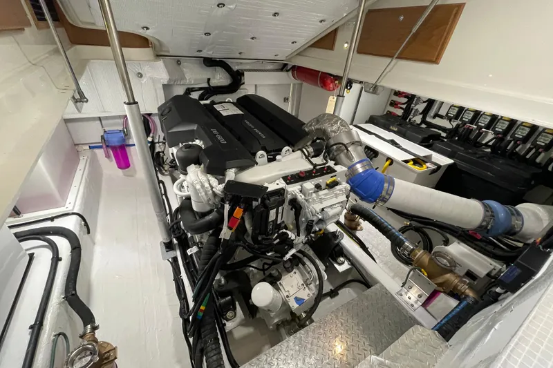 Slide: The Image of Engine room of 2026 Back Cove 372 boat, showcasing modern mechanical components. - 19