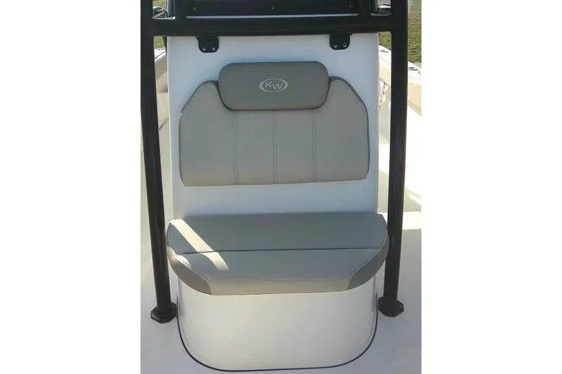 Slide: The Image of 2021 Key West 239 FS boat seat with gray cushioning and KW logo. - 22