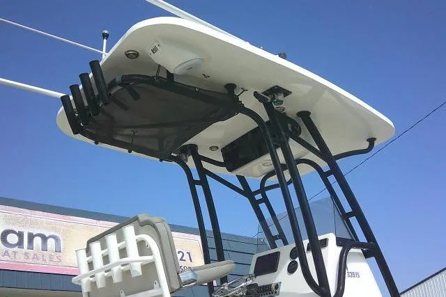 Slide: The Image of 2021 Key West 239 FS boat with T-top and rod holders, viewed from below. - 3
