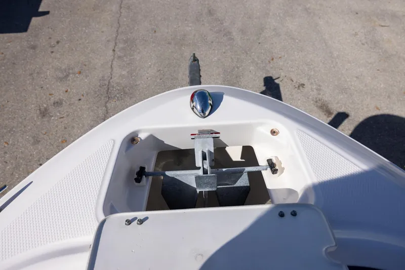Slide: The Image of 2018 Chaparral 21 H2O Sport OB boat anchor compartment, top view. - 12