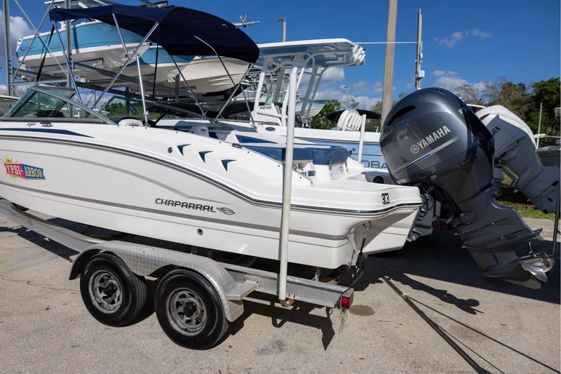 Slide: The Image of 2018 Chaparral 21 H2O Sport OB boat on trailer with Yamaha outboard motor. - 2