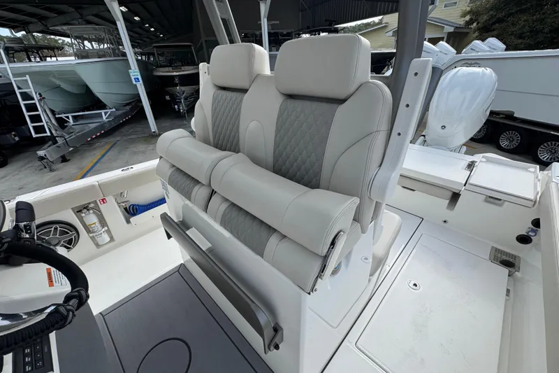Slide: The Image of Interior of 2026 Solace 28 HCS boat with luxurious seating and modern design. - 24