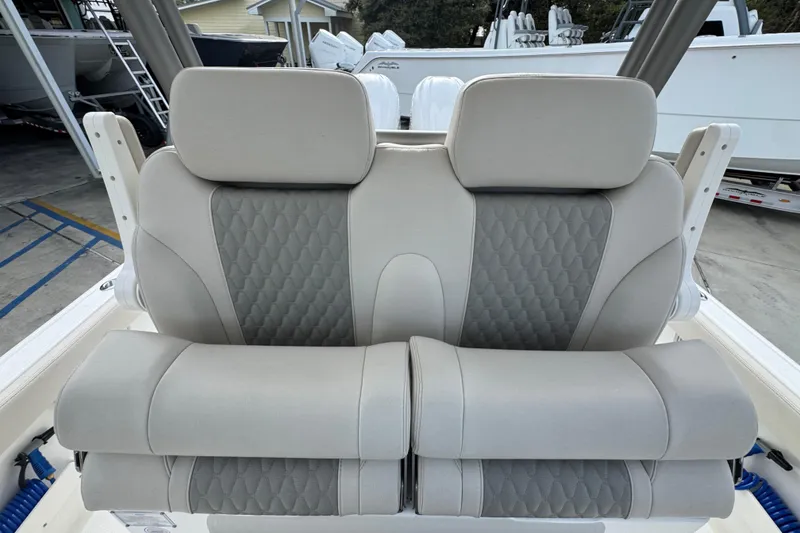 Slide: The Image of Luxurious seating on 2026 Solace 28 HCS boat, featuring elegant gray upholstery. - 25