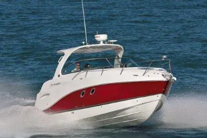 The Image of Manufacturer Provided Image: 2019 Rinker 320 EX boat cruising on open water. - 0