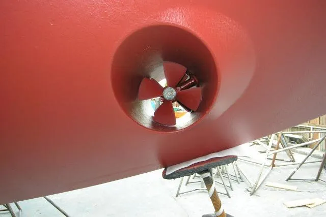 Slide: The Image of Engine compartment of 1982 Ta Shing Mason 63 sailboat, showcasing mechanical components and wiring. - 103