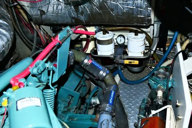 Slide: The Image of Engine room of 1982 Ta Shing Mason 63 yacht with visible machinery and components. - 107