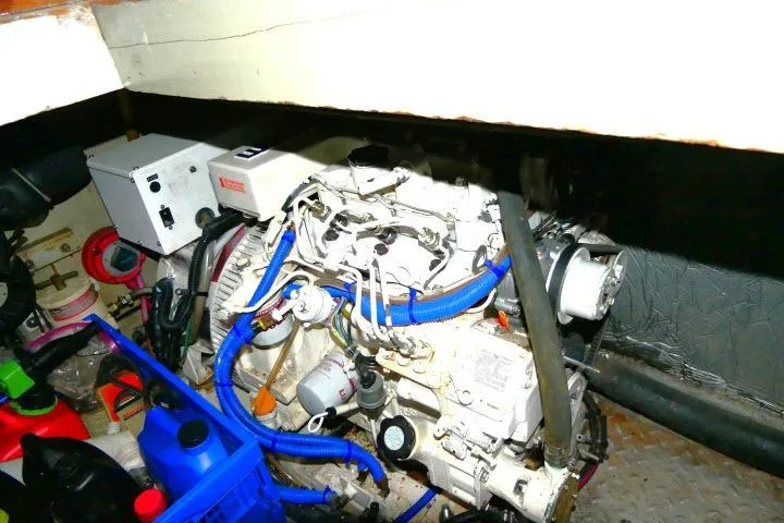 Slide: The Image of Engine room of 1982 Ta Shing Mason 63 yacht, featuring mechanical components and wiring. - 108
