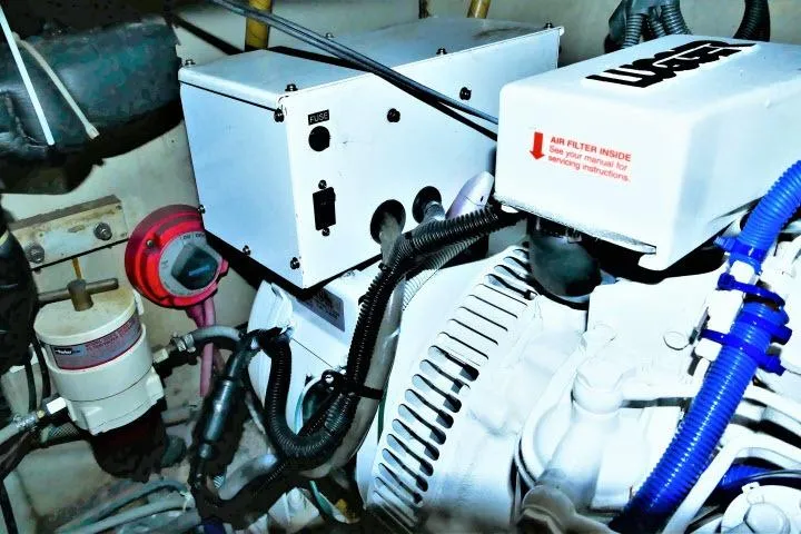 Slide: The Image of 1982 Ta Shing Mason 63 sailboat docked in marina, featuring classic design and wooden accents. - 109