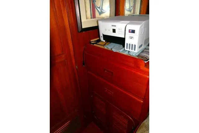 Slide: The Image of Interior storage of 1982 Ta Shing Mason 63 yacht with organized shelves and containers. - 28