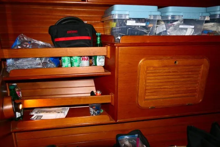 Slide: The Image of Interior of 1982 Ta Shing Mason 63 yacht with organized storage and wooden cabinetry. - 29