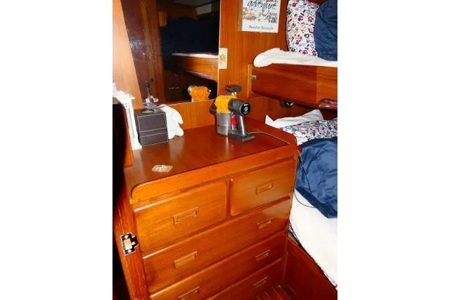 Slide: The Image of 1982 Ta Shing Mason 63 yacht bathroom with wooden cabinets and modern fixtures. - 37
