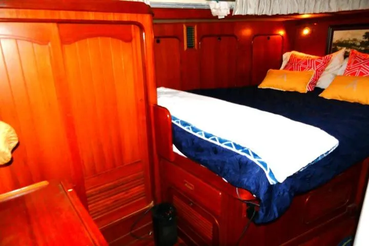 Slide: The Image of Wooden dresser with mirror in 1982 Ta Shing Mason 63 yacht interior. - 43