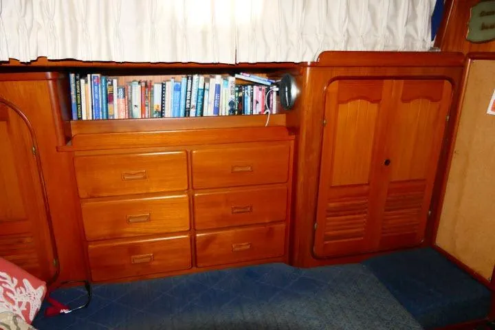 Slide: The Image of Interior of 1982 Ta Shing Mason 63 yacht with wooden cabinetry and nautical decor. - 46