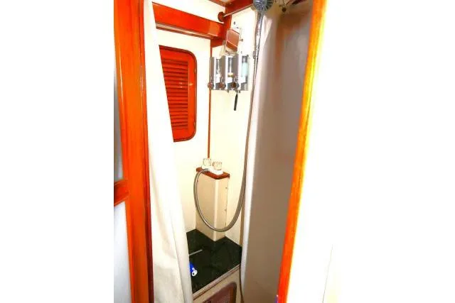 Slide: The Image of Laundry area in 1982 Ta Shing Mason 63 yacht with washer and sink. - 52