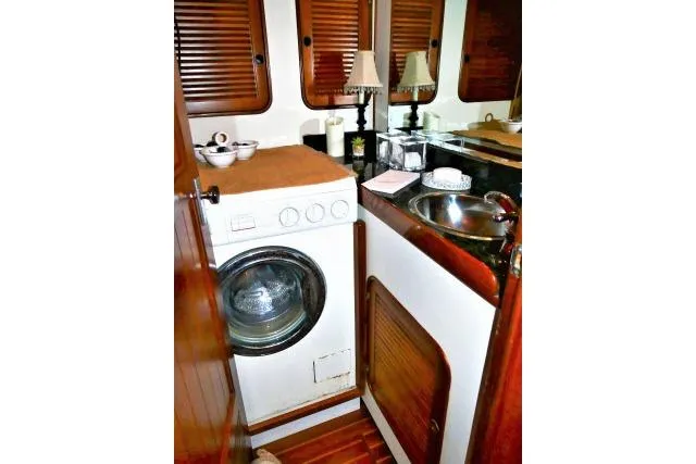 Slide: The Image of Laundry area in 1982 Ta Shing Mason 63 yacht with washing machine and sink. - 53