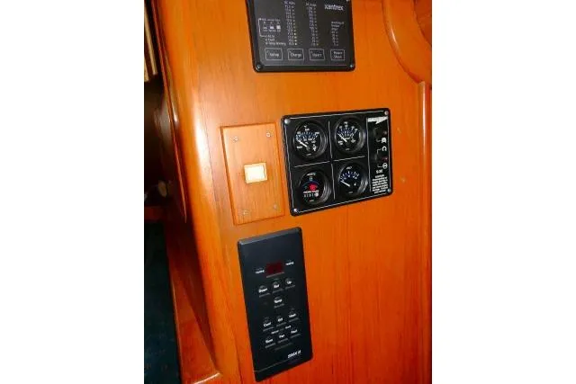 Slide: The Image of Control panel of 1982 Ta Shing Mason 63 yacht with gauges and switches. - 56
