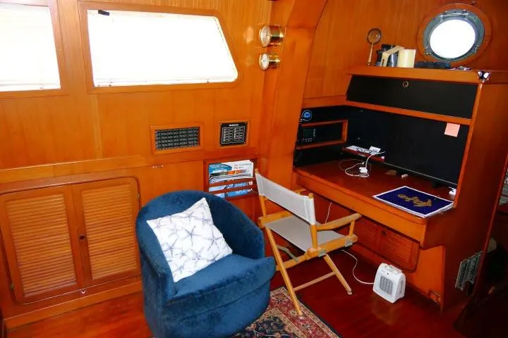 Slide: The Image of Interior of 1982 Ta Shing Mason 63 yacht with wooden furnishings and nautical decor. - 8
