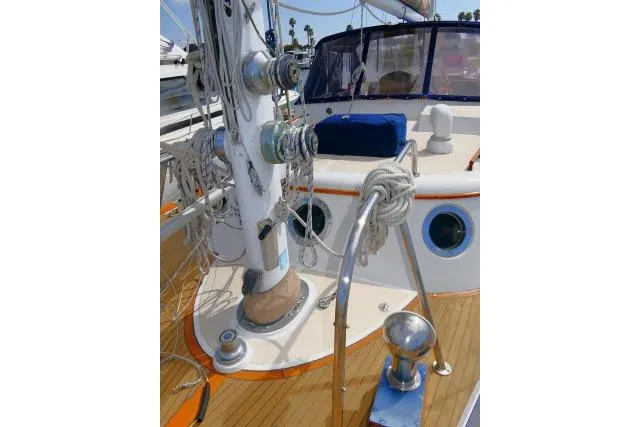Slide: The Image of Deck of 1982 Ta Shing Mason 63 yacht with anchor chain and winch. - 83