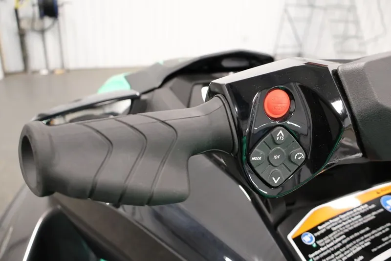 Slide: The Image of Close-up of 2026 Sea-Doo GTI SE 130 handlebar controls with buttons and grip. - 19