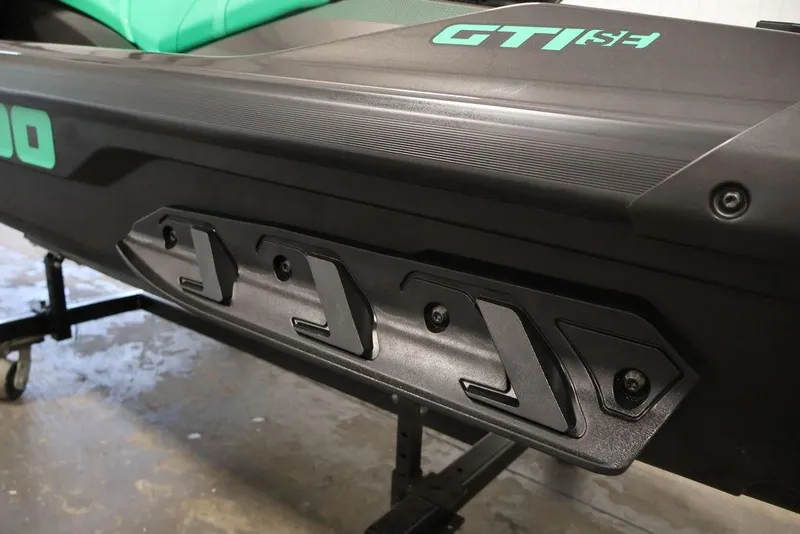 Slide: The Image of 2026 Sea-Doo GTI SE 130 side view showcasing sleek design and branding. - 14