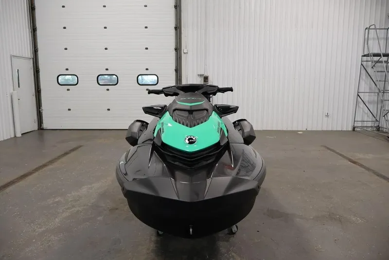 Slide: The Image of 2026 Sea-Doo GTI SE 130 jet ski in a garage, front view. - 22