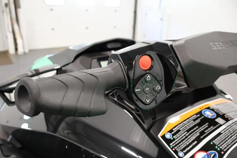Slide: The Image of 2026 Sea-Doo GTI SE 130 handlebar controls with buttons and grip detail. - 20