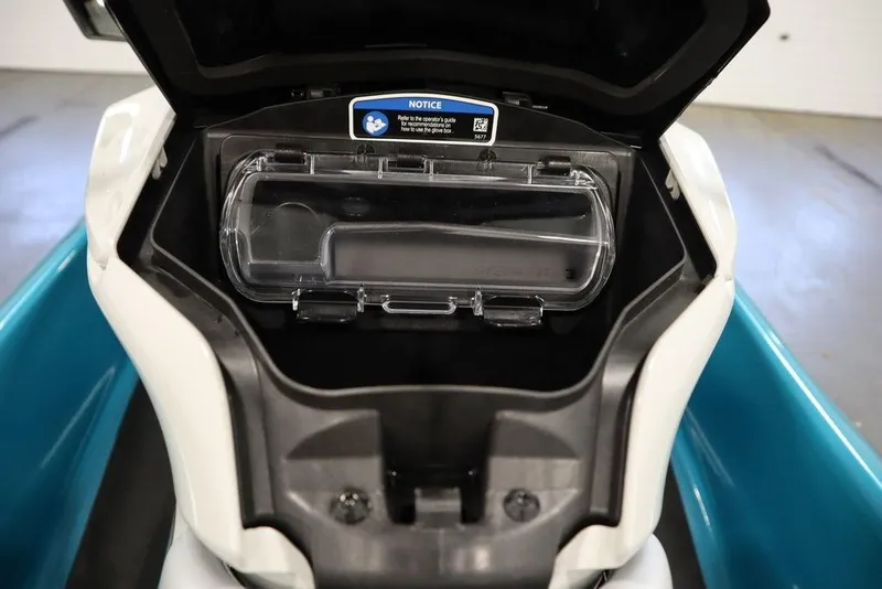 Slide: The Image of 2026 Sea-Doo GTI SE 130 storage compartment with open lid, showcasing interior design. - 10