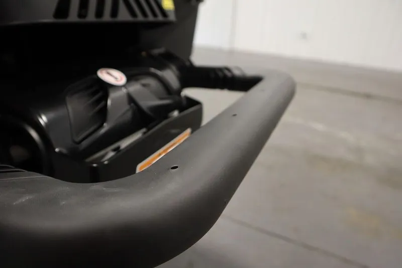 Slide: The Image of Close-up of 2026 Sea-Doo GTI SE 130 handlebar in a garage setting. - 24