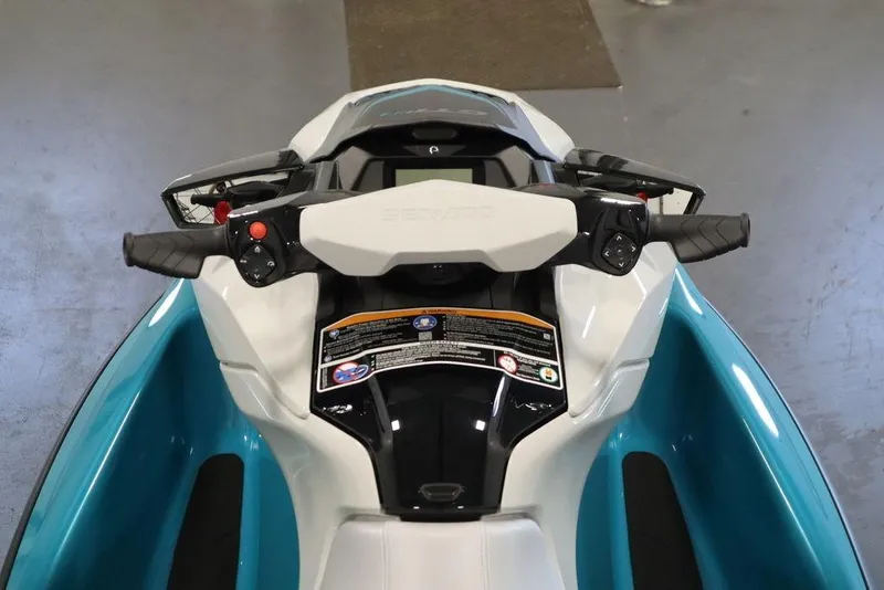 Slide: The Image of 2026 Sea-Doo GTI SE 130 jet ski dashboard with handlebars and control panel. - 4