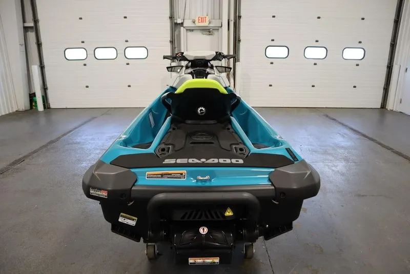 Slide: The Image of 2026 Sea-Doo GTI SE 130 jet ski in a garage, rear view. - 5