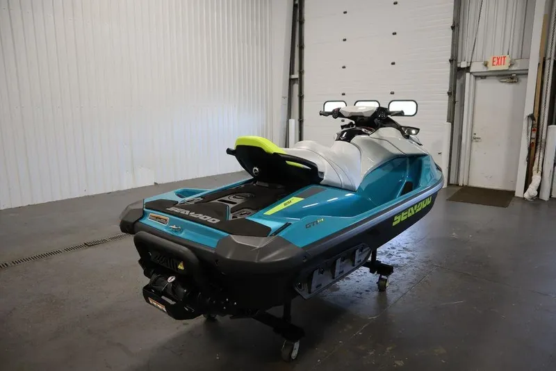 Slide: The Image of 2026 Sea-Doo GTI SE 130 jet ski in a garage setting. - 6