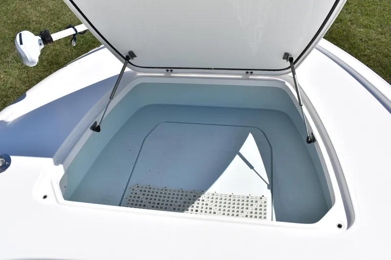 Slide: The Image of Open storage compartment on 2018 Contender 25 Bay boat, showcasing spacious interior. - 10
