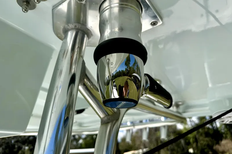 Slide: The Image of Close-up of a 2018 Contender 25 Bay boat's polished metal fixture. - 30