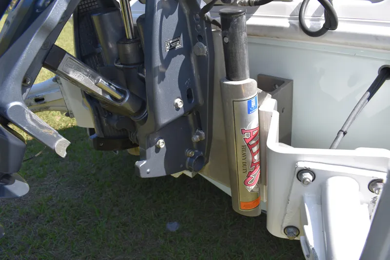 Slide: The Image of 2018 Contender 25 Bay boat engine mount with hydraulic steering components. - 32