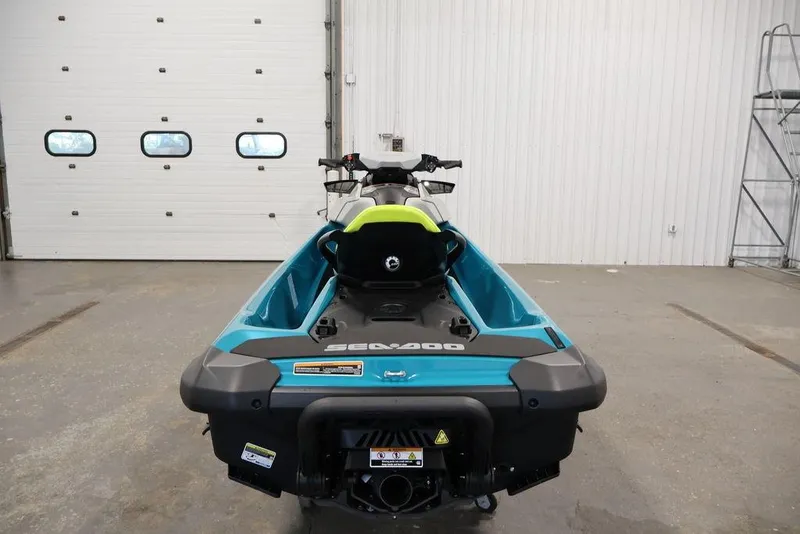 Slide: The Image of 2026 Sea-Doo GTI SE 170 jet ski in a garage, rear view. - 14
