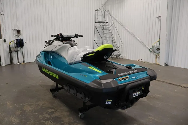 Slide: The Image of 2026 Sea-Doo GTI SE 170 jet ski in a garage setting. - 18