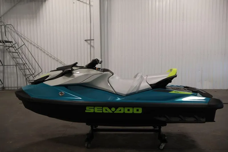Slide: The Image of 2026 Sea-Doo GTI SE 170 jet ski in a showroom, side view. - 19