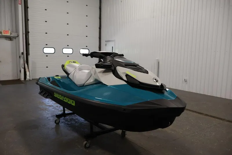 Slide: The Image of 2026 Sea-Doo GTI SE 170 jet ski in a garage setting. - 20